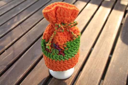 Orange-grüne Eierwärmer